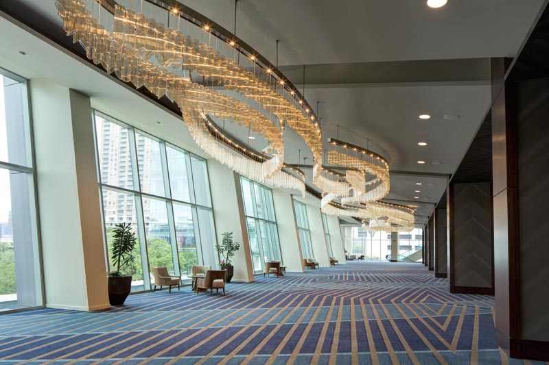 Glass chandelier installation at Marriott Marquis